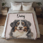 Blanket with a dog portrait and 'Daisy' text on a bed in a bedroom setting