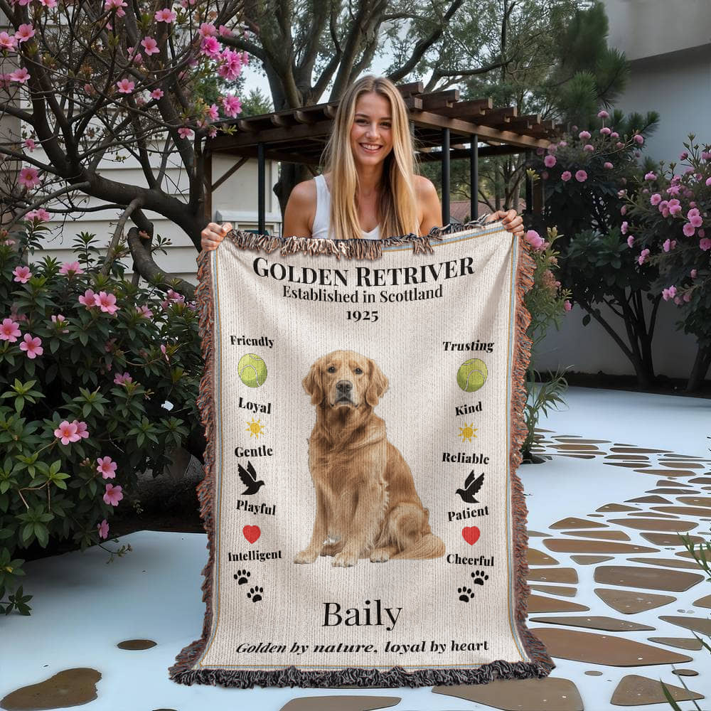 Woman holding a Golden Retriever-themed blanket with text and graphics.
