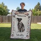 boy holding a blanket with a pitbull design and text outdoors. Personalize your favorite picture of your Pitte on this custom woven blanket with their name.