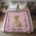 Pink blanket with a Labrador Retriever design and text on a bed in a bedroom setting. Personalize your woven blanket with your favorite Labrador's photo and Name.