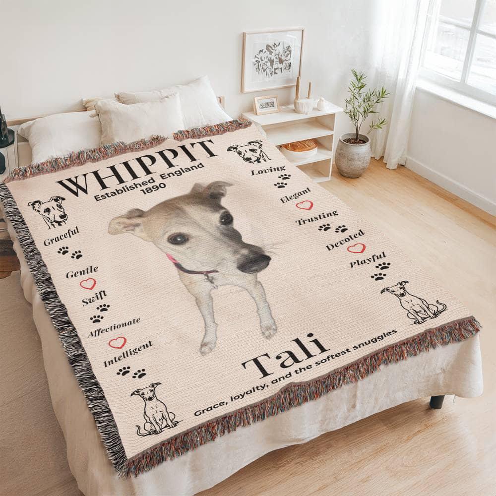 Blanket with a whippet design and text on a bed in a room. Personalize your woven blanket with your favorite photo of your Whippit.