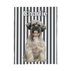 Notebook with a dog illustration and name 'Charlie' on a black and white striped background