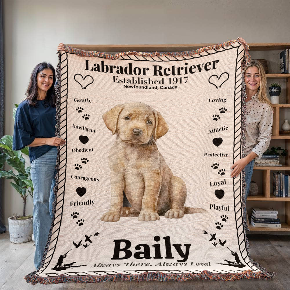 Two people holding a Woven blanket with a Labrador Retriever design and text.  Personalized with the name and photo of a Labrador dog.