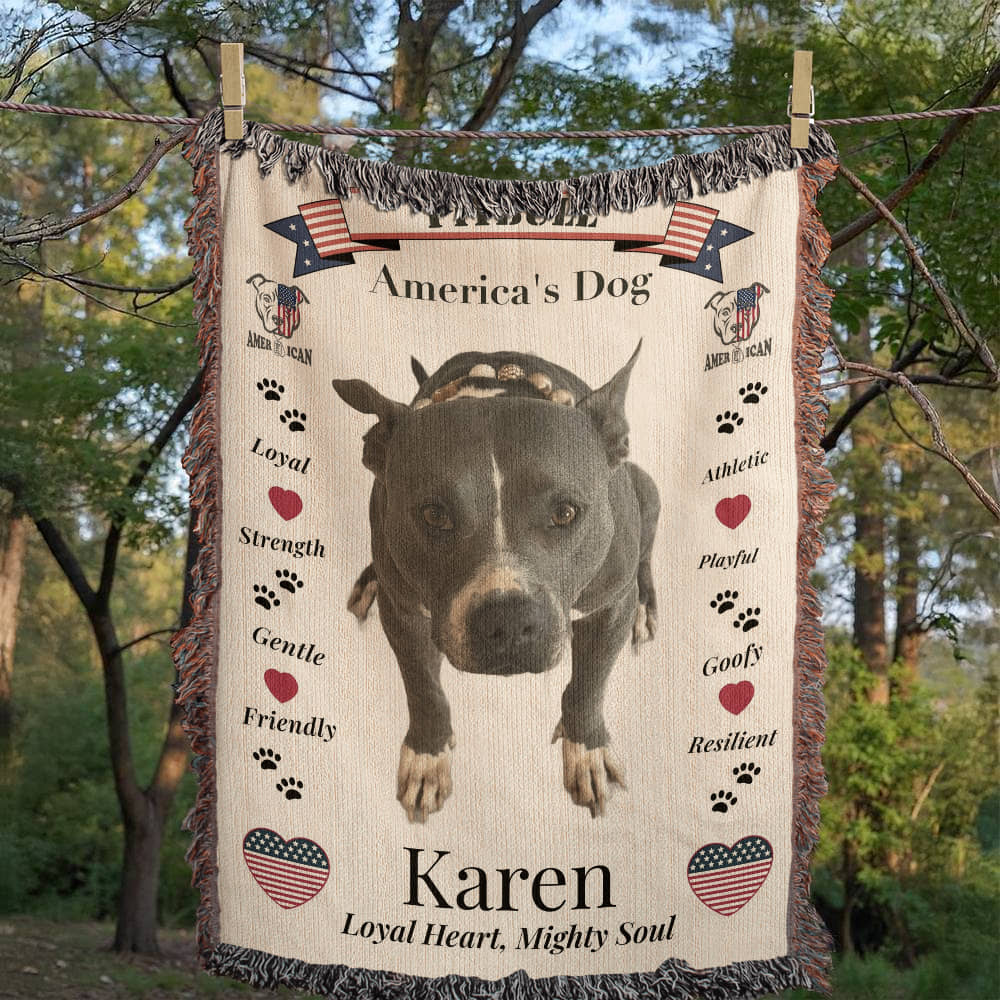 Blanket with a dog's portrait and text about loyalty, strength, and other qualities, set against a natural background. Personalize your woven blanket with your favorite picture of your Pittie with their name.