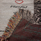 Textured fabric with colorful fringes and the word 'Playful' on a patterned background.