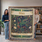 Two people holding a woven tarot card decorative blanket with a pitbull design and personalized with the name 'Max' printed on it.
