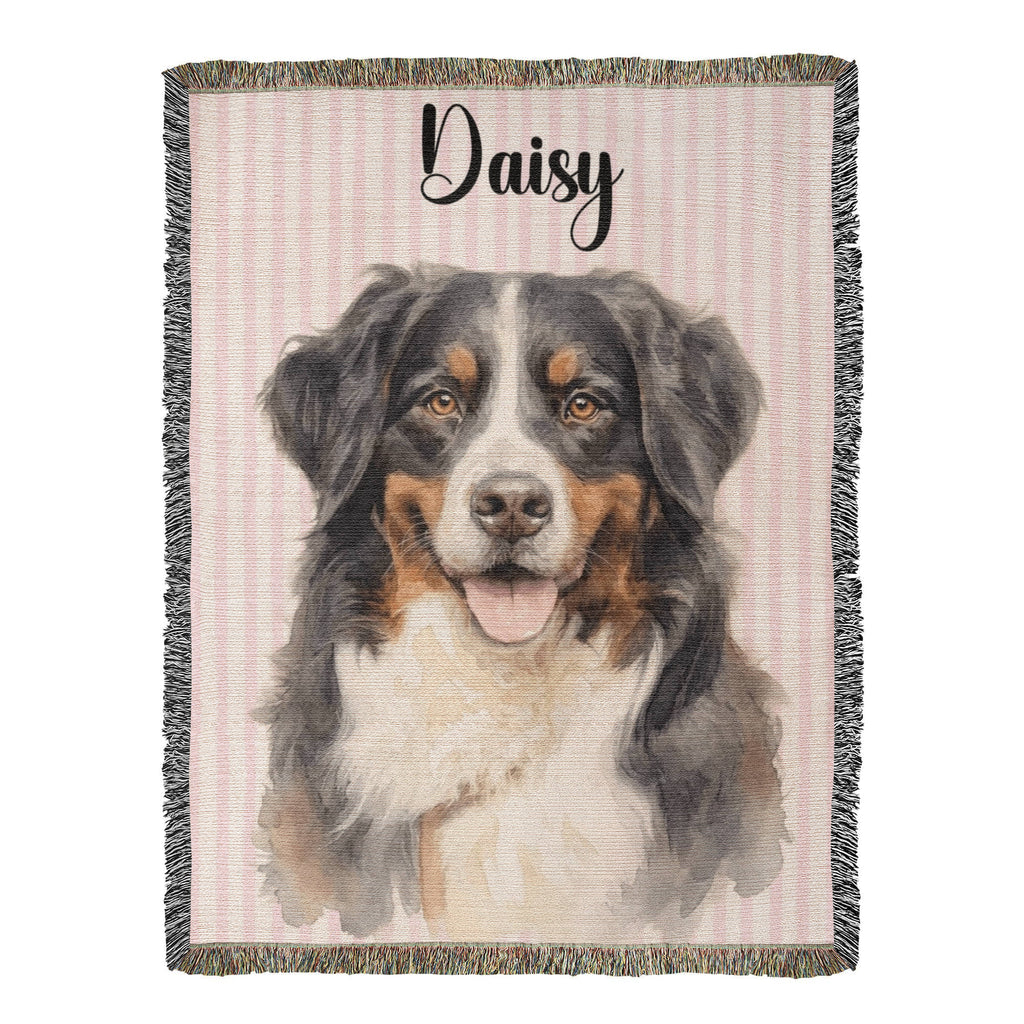 Woven blanket with a dog portrait and the name 'Daisy' on a pink background