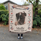 Person holding a blanket with a pitbull design and text outdoors. Personalize your favorite picture of your Pitte on this custom woven blanket with their name.