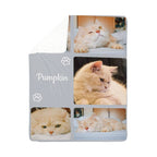 Cat-themed blanket with images of a cat named 'Pumpkin' and paw prints on a white background.
