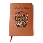 Brown notebook with floral paw design and text on a white background
