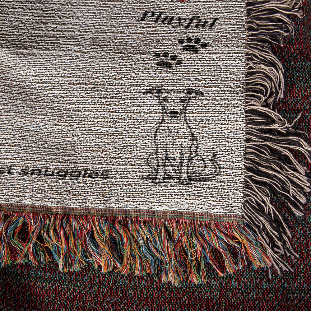 Textile product with a dog illustration and text on a textured background