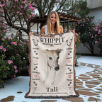 Woman holding a blanket with a whippet design and text outdoors. Personalize your woven blanket with your favorite photo of your Whippit.