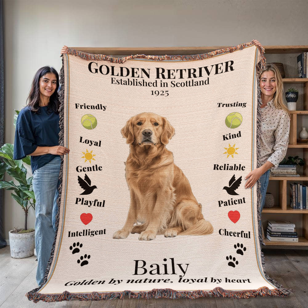 Two people holding a Golden Retriever-themed blanket with a dog's photo and text.