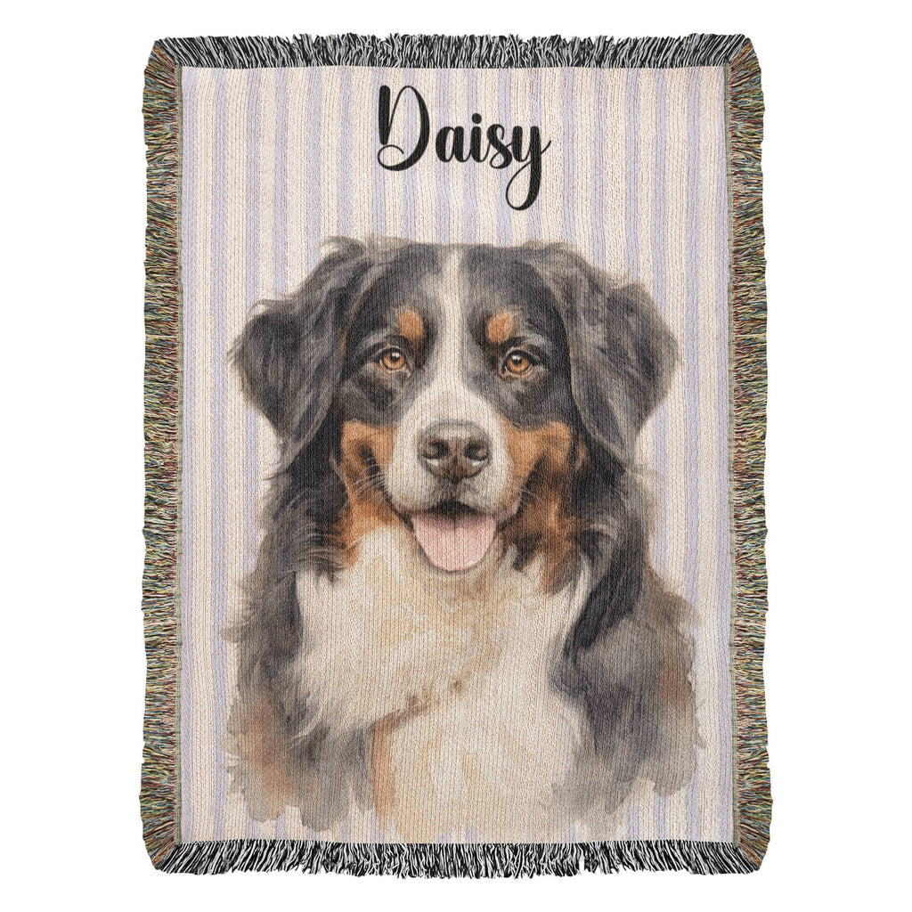 Woven blanket with a dog portrait and the name 'Daisy' on a striped background