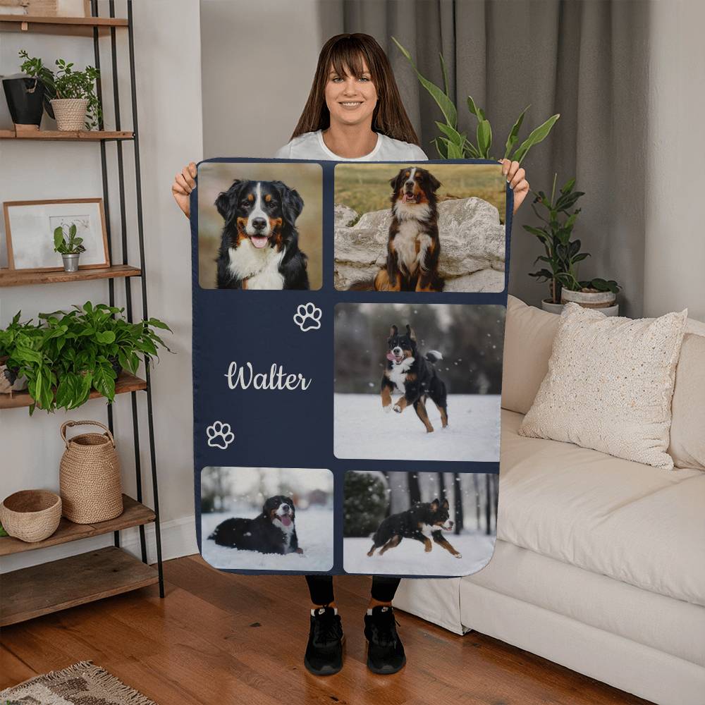Person holding a photo blanket with images of a dog named Walter in a living room setting.