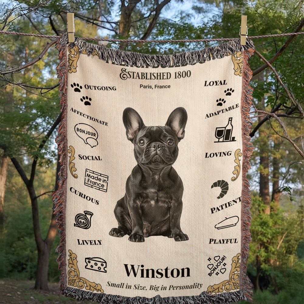 Blanket with a dog illustration and text, hanging outdoors.Personalized with your Frenchie's Name and photo,