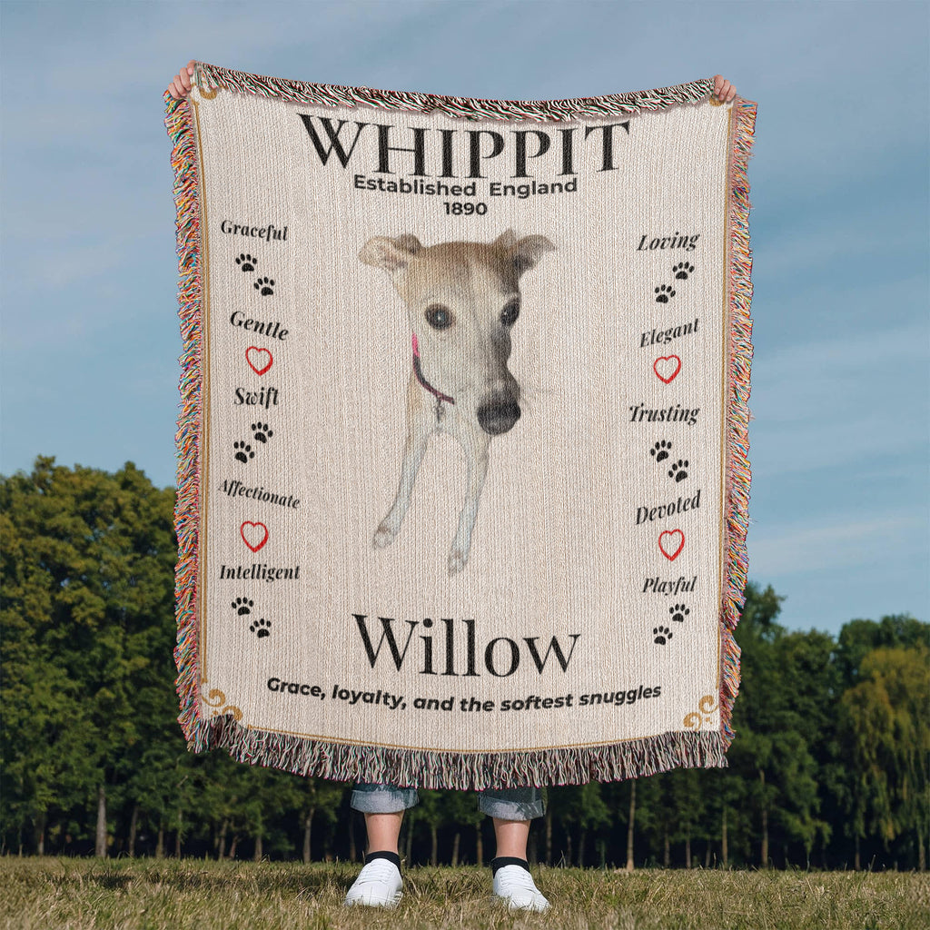 Blanket with a whippet design and text about the breed, held by a person in an outdoor setting. Personalize your Whippit woven blanket with your favorite photo and your dog's name.