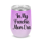 A light purple insulated stemless wine tumbler with a clear lid, featuring the text 'In My Frenchie Mom Era' in black script, set against a plain white background.