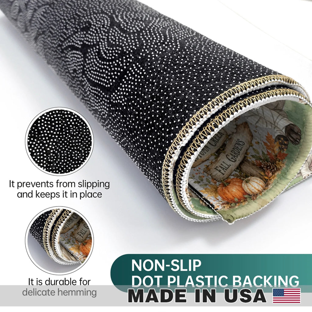 A rolled black fabric with a white dotted non-slip pattern and a decorative printed inner layer, shown on a white background with two circular detail insets and text reading 'NON-SLIP DOT PLASTIC BACKING MADE IN USA'.