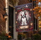 A decorative Halloween flag hanging from a black metal house bracket on a brick home exterior. The flag features a pitbull-type dog dressed as a vampire with the text 'Fangs for Visiting' and the name 'Cooper' at the bottom.