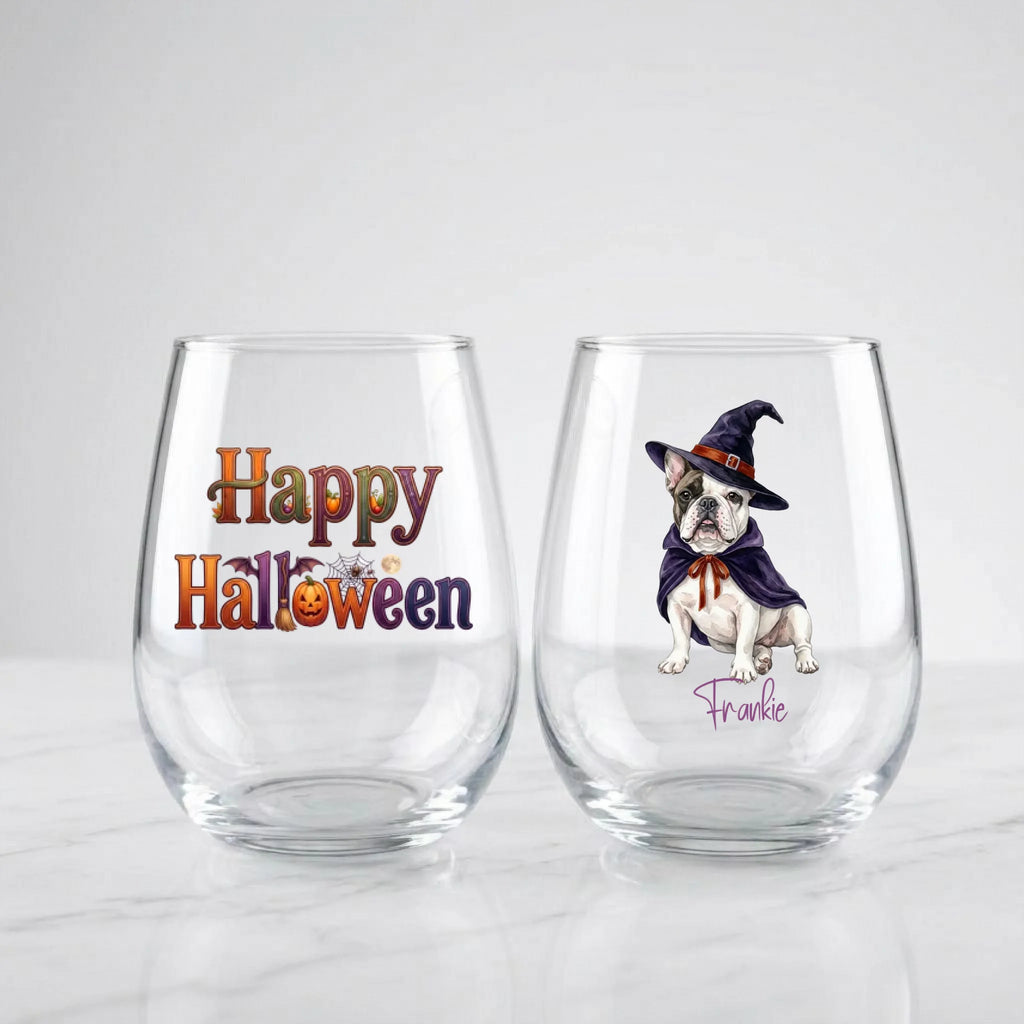 Two personalized Halloween stemless wine glasses on marble, one with 'Happy Halloween' lettering, one with a watercolor witch-costume dog and pet name