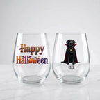 Two personalized Halloween stemless wine glasses on marble, one with 'Happy Halloween' lettering, one with a watercolor vampire-costume dog and pet name