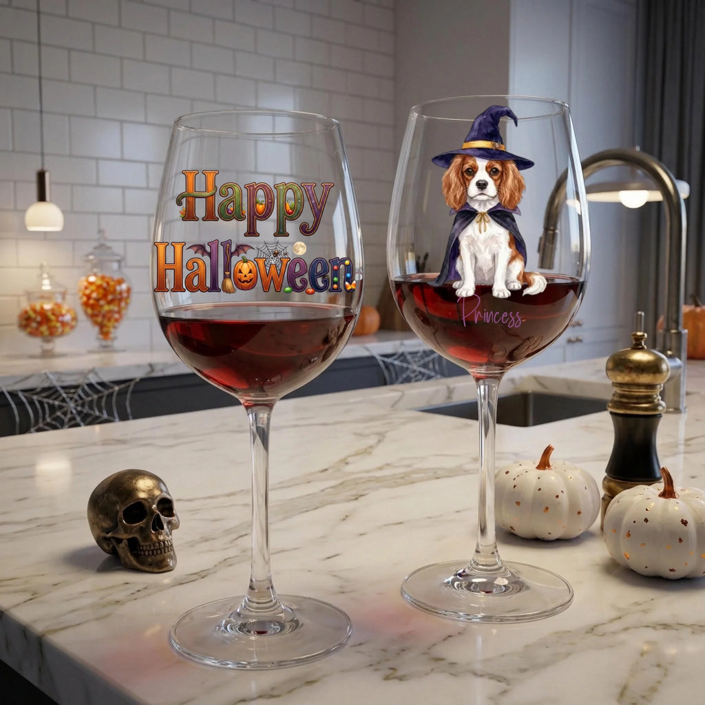 Halloween dog stemmed wine glasses on a marble kitchen counter with white pumpkins and a gold skull