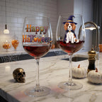 Halloween dog stemmed wine glasses on a marble kitchen counter with white pumpkins and a gold skull