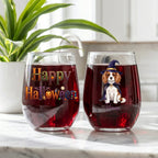 Personalized witch dog stemless wine glasses filled with red wine, Happy Halloween design on marble counter