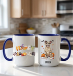 Midnight blue handle Halloween mugs: Happy Halloween design and personalized mummy dog mug, on a kitchen counter