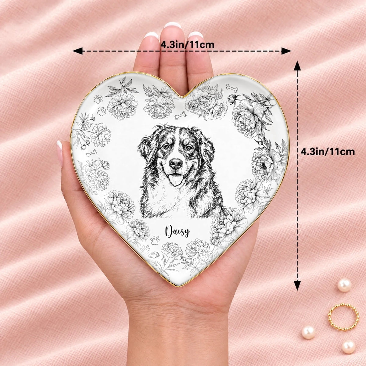 Heart floral pet sketch ring dish resting on an open hand, 4.3 inches across