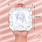 Hand holding a vintage sketch pet portrait wavy square ring dish, 4.1 inches across
