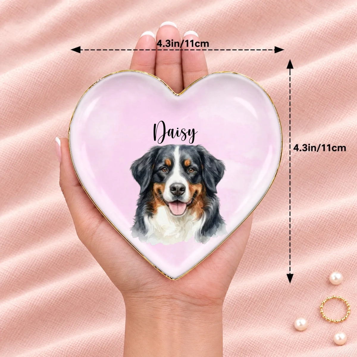 Hand holding a personalized pet portrait heart ring dish, 4.3 inches across
