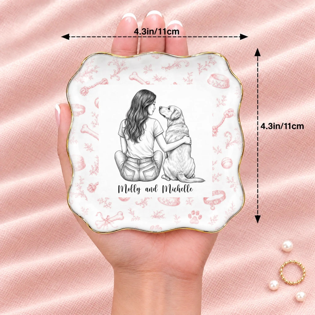 Hand holding a vintage sketch person and pet wavy square ring dish, 4.1 inches across