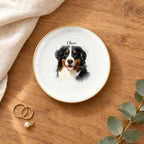 Round watercolor splash pet portrait ring dish on a wooden table with linen and eucalyptus