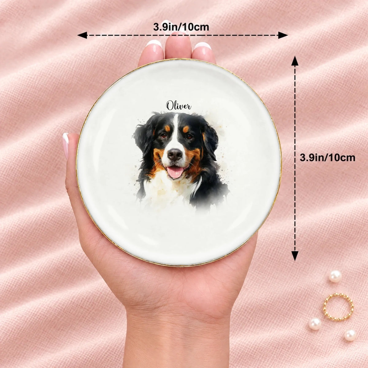Round watercolor splash pet portrait ring dish resting on an open hand, 3.9 inches across