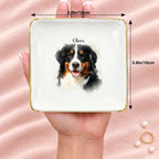 Square watercolor splash pet portrait ring dish resting on an open hand, 3.9 inches across