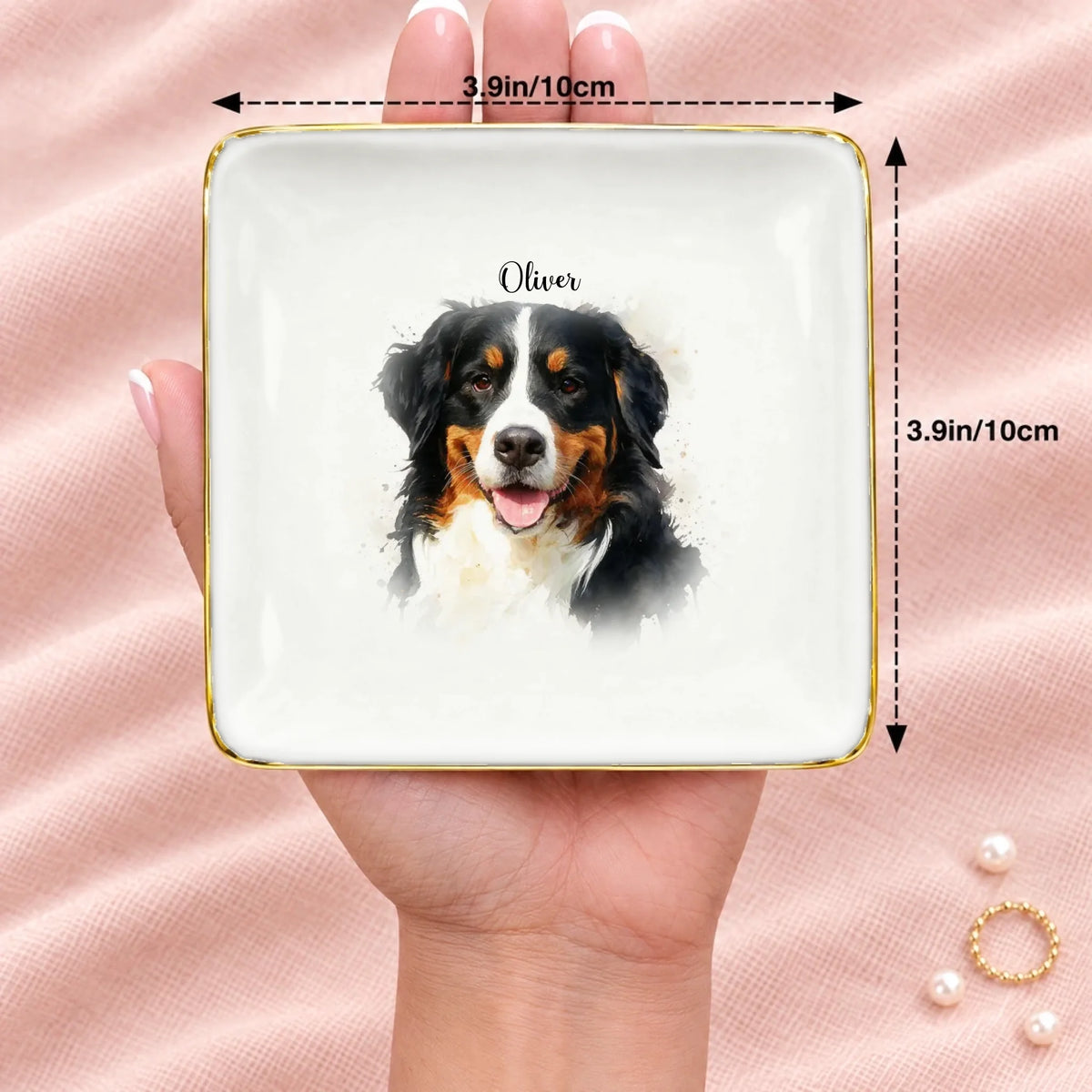 Square watercolor splash pet portrait ring dish resting on an open hand, 3.9 inches across