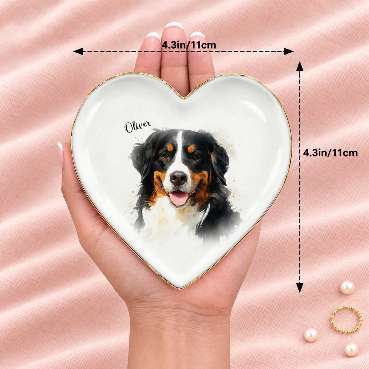 Heart watercolor splash pet portrait ring dish resting on an open hand, 4.3 inches across