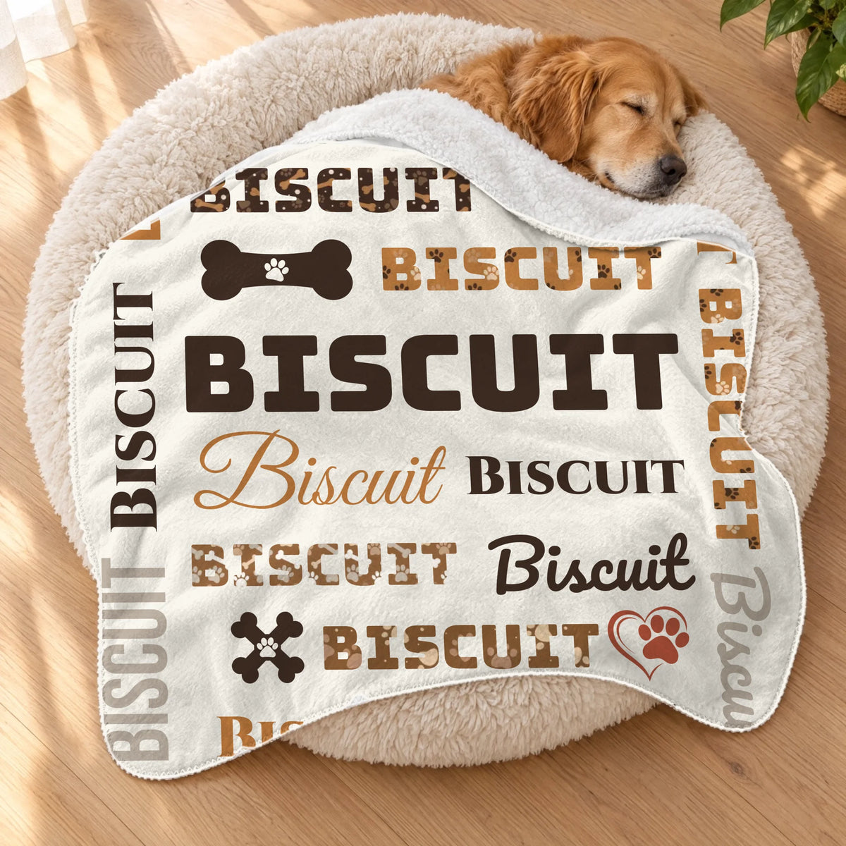 Golden retriever asleep in a fluffy dog bed under a personalized dog name sherpa blanket