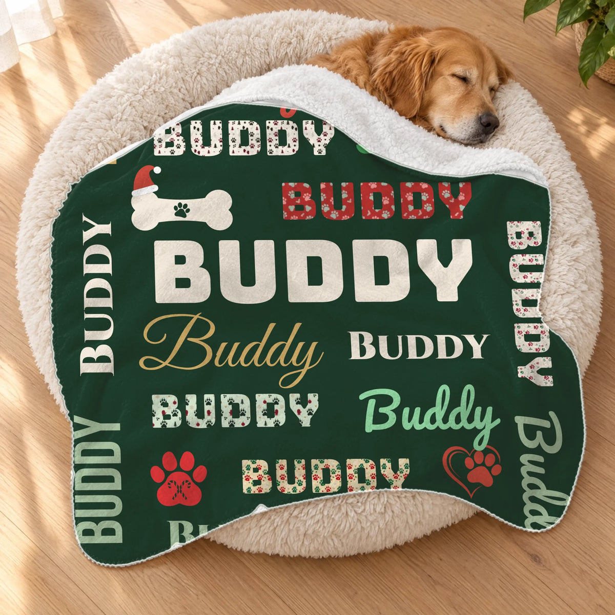 Golden retriever asleep in a fluffy dog bed under a personalized Christmas sherpa blanket
