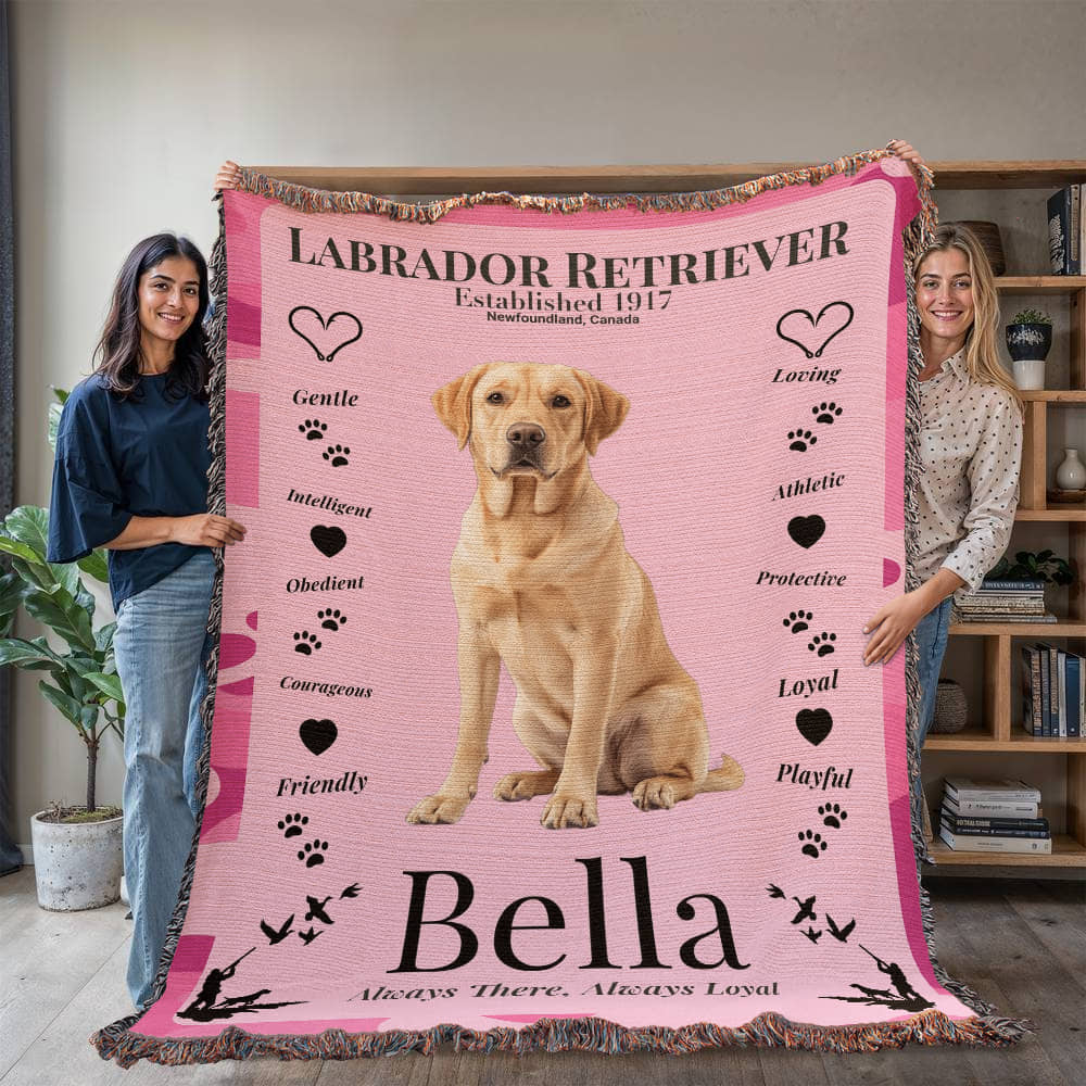 Two people holding a pink Labrador Retriever-themed blanket with the name 'Bella'.Personalize your woven blanket with your favorite Labrador's photo and Name.