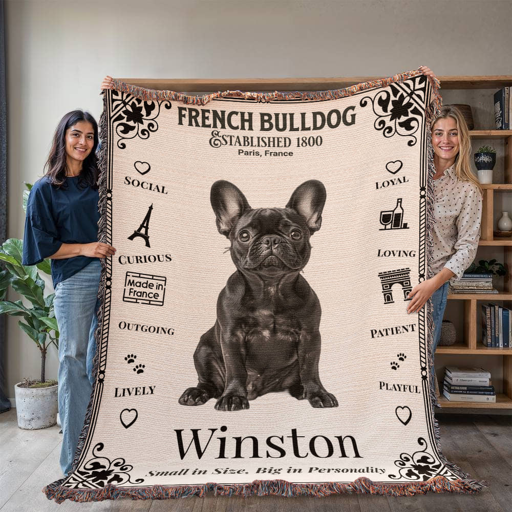 Two people holding a French Bulldog-themed blanket with the name 'Winston' on it.Personalized with the name and photo of your Frenchie.
