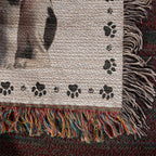 Textured fabric with paw print pattern and colorful fringe