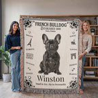 Two people holding a French Bulldog-themed woven blanket with the name 'Winston'.Personalized with the name and photo of your Frenchie.