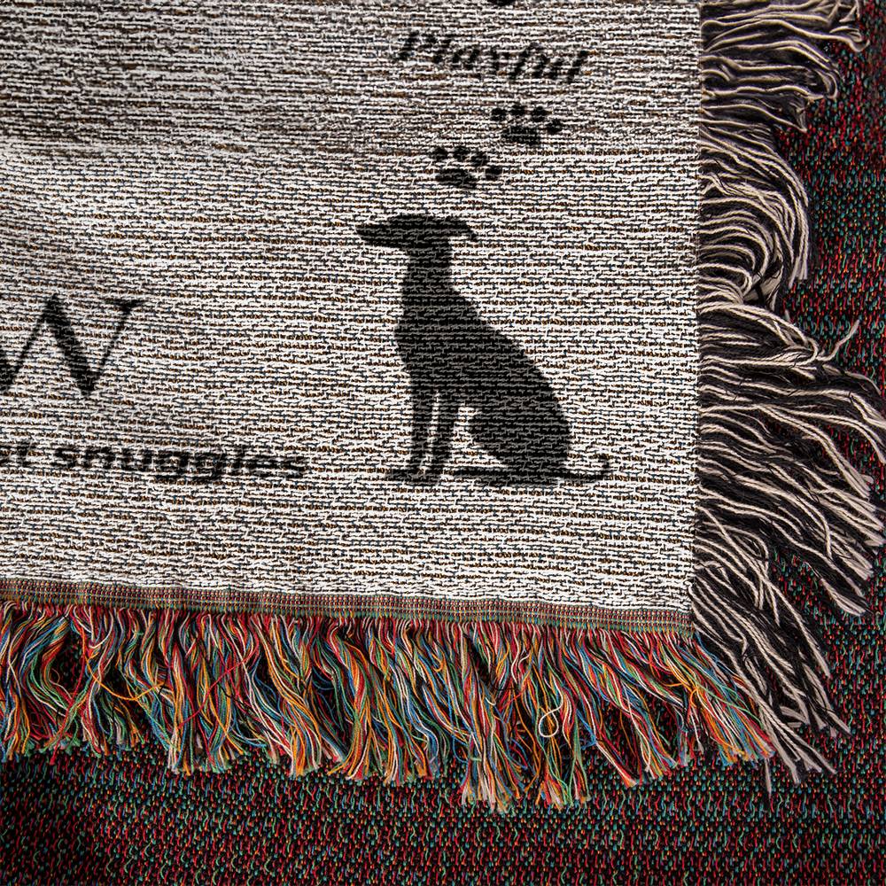 Textile product with a dog silhouette and text on a textured background