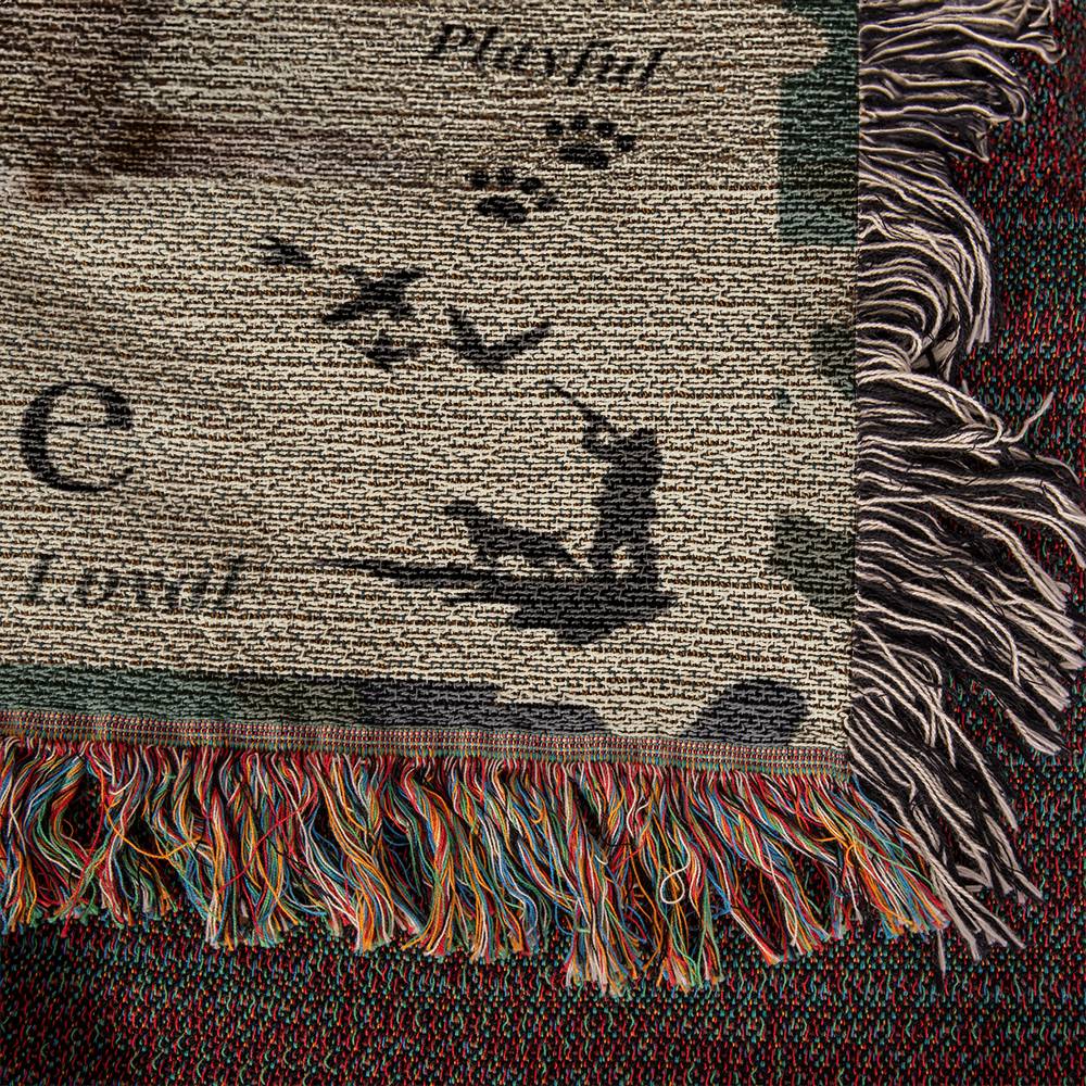 Textile with paw prints and fringes on a textured background