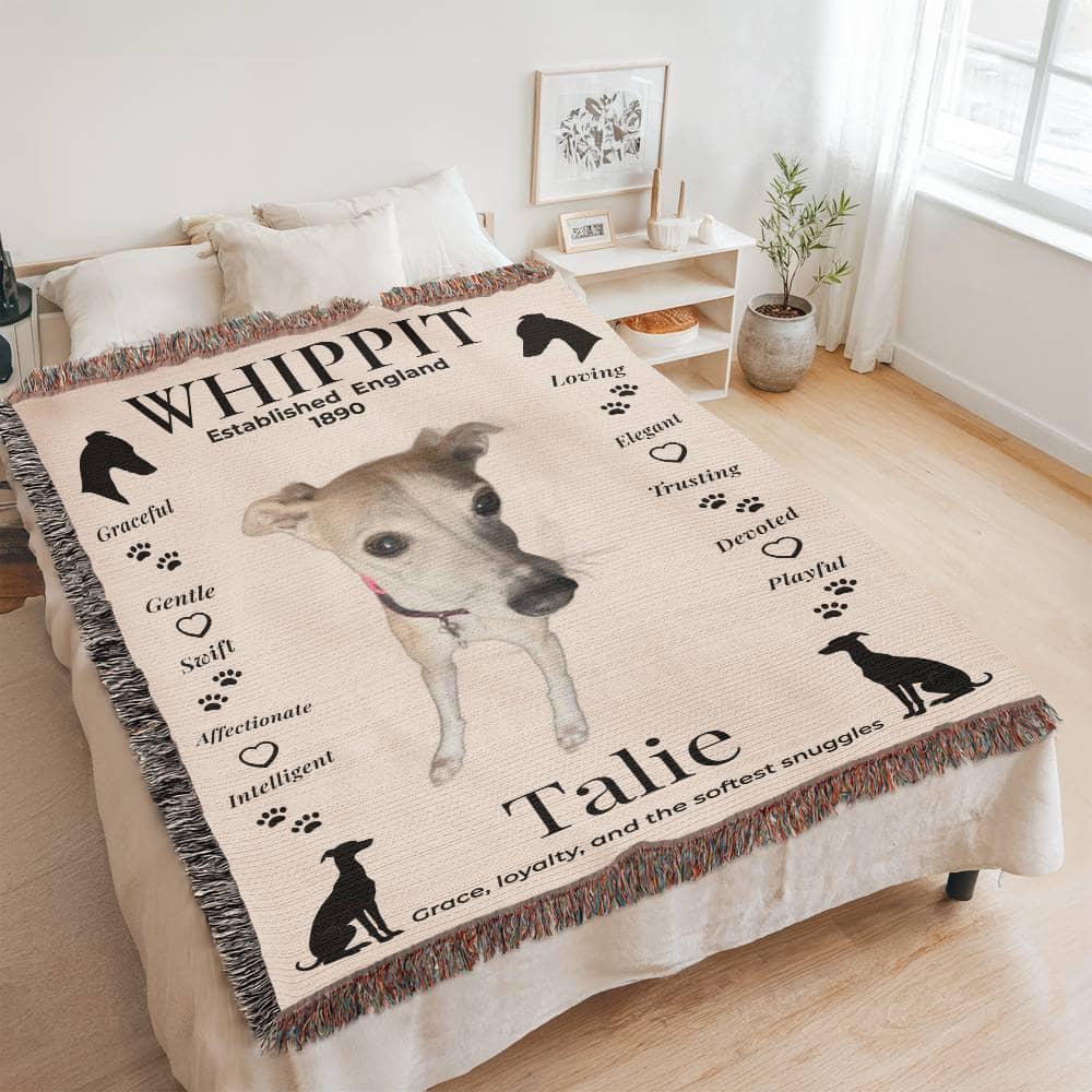 Blanket with a whippet design and text on a bed in a room. Personalize your woven blanket with your favorite photo of your Whippit.