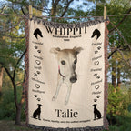 Blanket with a whippet design and text, displayed outdoors. Personalize your woven blanket with your favorite photo of your Whippit.