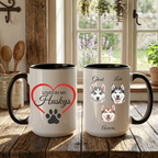 Two mugs with husky designs on a wooden surface in a kitchen.